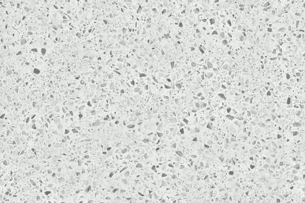 Gray terrazzo texture with scattered stone chips