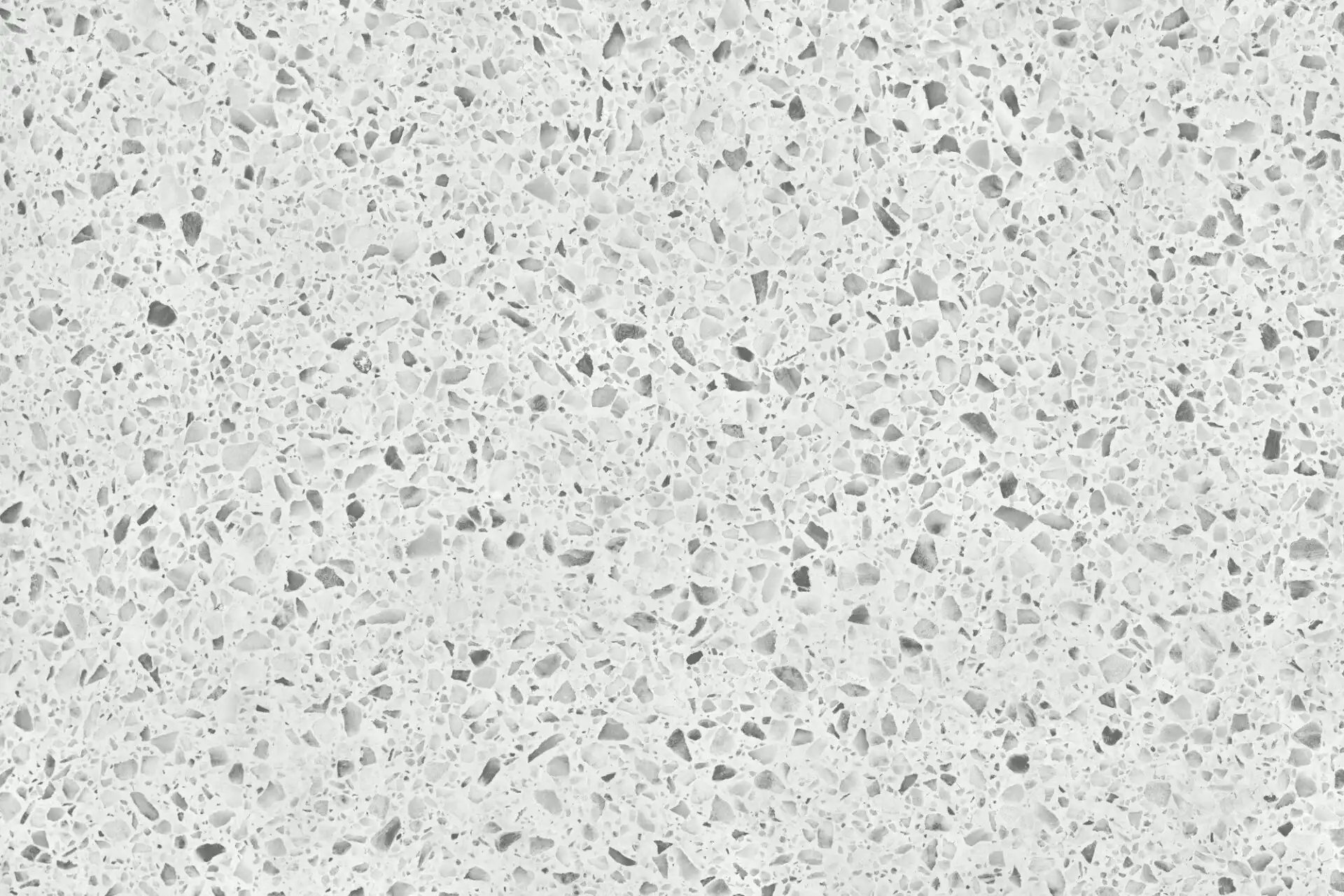 Gray terrazzo texture with scattered stone chips