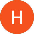 Orange circle with white letter H